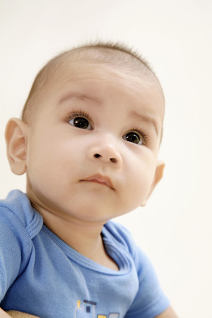 Baby looking upの写真素材