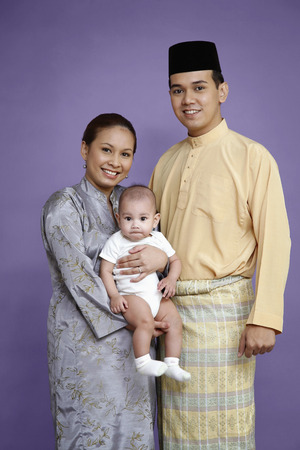 Portrait of man, woman and babyの写真素材