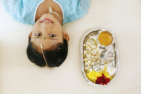 Girl lying on the floor, smiling