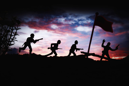 Toy soldiers on battlefieldの写真素材