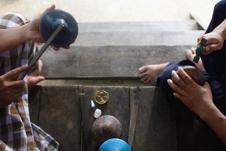Men repairing top