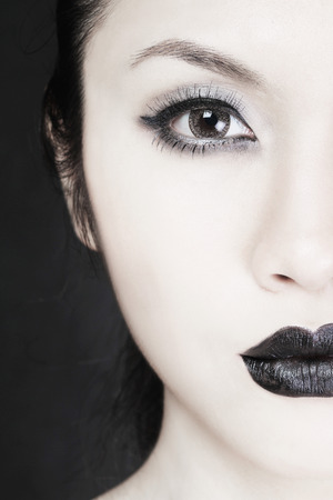 Woman wearing black make-upの写真素材