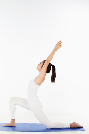 Woman practising yogaの写真素材