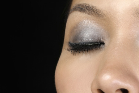 Close-up on woman's eye with make-upの写真素材