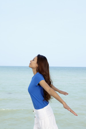 Woman enjoying the fresh airの写真素材