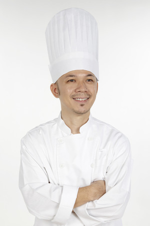 Asian chef posing with arms crossedの写真素材