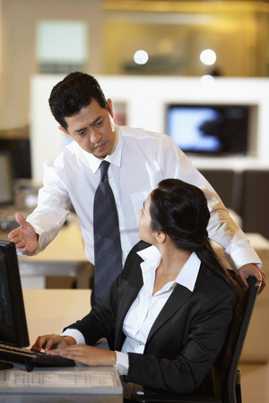 Business colleagues chatting with each otherの写真素材