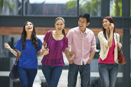 Friends laughing and smilingの写真素材