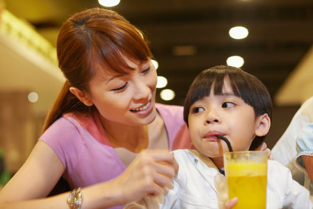 Boy having a drinkの写真素材