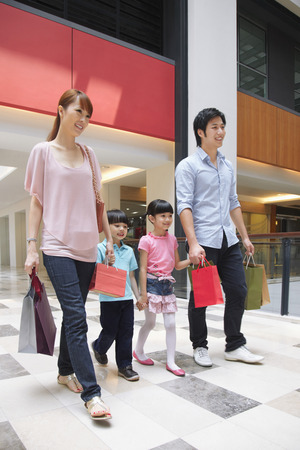 Family walking hand in handの写真素材