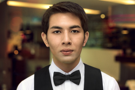 Waiter smiling at the camera
