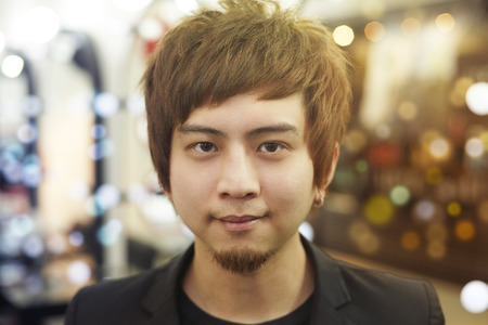 Portrait of a man smiling at the cameraの写真素材