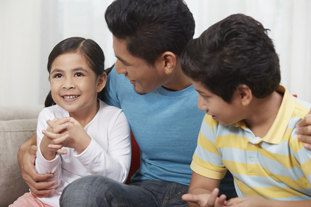 Father talking to his childrenの写真素材
