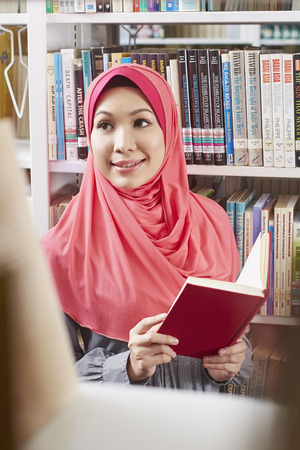 A student in libraryの写真素材