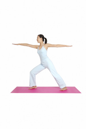 Young woman practising yogaの写真素材