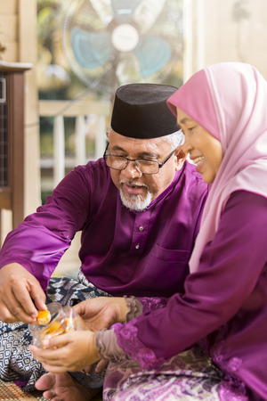Muslim family feasting during the Eid celebrationの写真素材