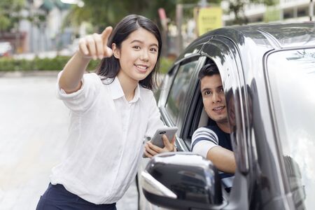 Person using an e-hailing serviceの写真素材
