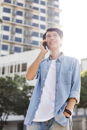 Young man on the phoneの写真素材