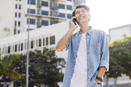 Young man on the phoneの写真素材