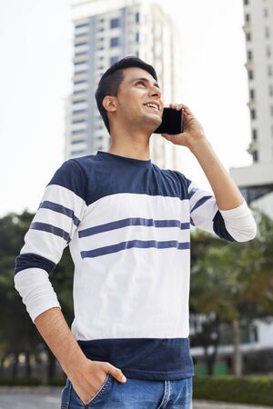 Young man on the phoneの写真素材