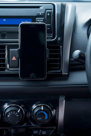 Car interior with a smartphoneの写真素材