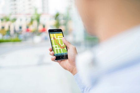 Man using gps navigation on his phone
