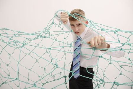 Man trapped under netの写真素材