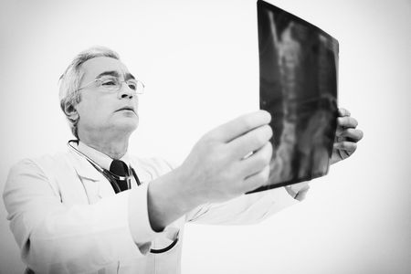 Doctor examining x-ray