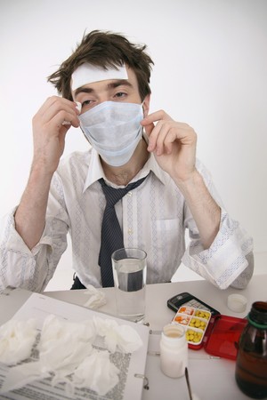 Sick man wearing surgical mask
