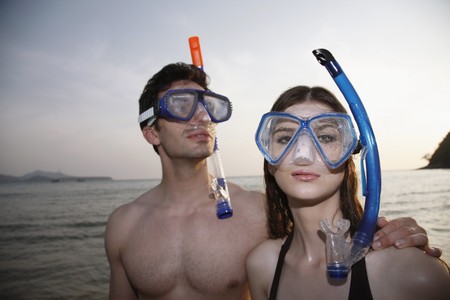 Man and woman with scuba maskの写真素材