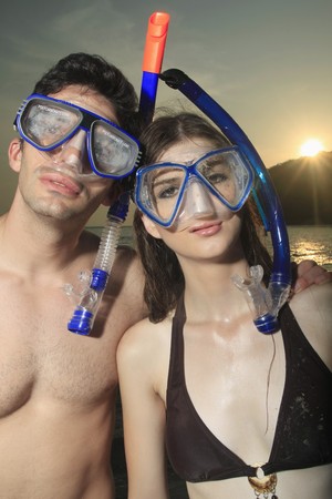 Man and woman with scuba maskの写真素材