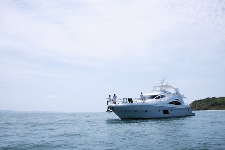 Two couples relaxing on yachtの写真素材