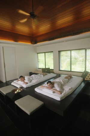  Women lying on massage tableの写真素材