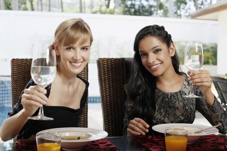 Women with glasses of waterの写真素材