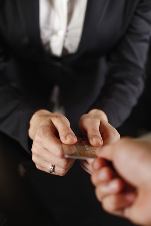 Woman paying with credit cardの写真素材