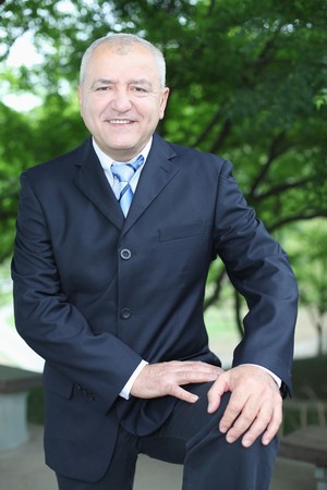 Businessman in full suit smilingの写真素材