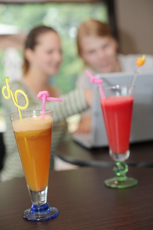 Glasses of drinks on the tableの写真素材