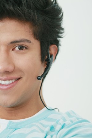 Man with headset smilingの写真素材