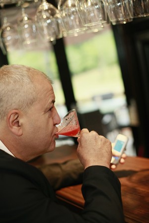 Man drinking at the bar