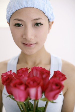 Woman holding rosesの写真素材