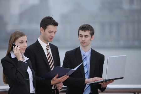 Business people working outdoorsの写真素材