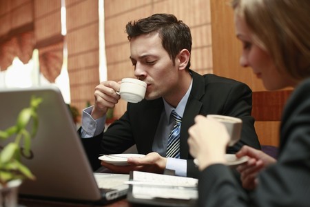 Business people enjoying coffeeの写真素材