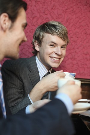 Businessmen enjoying coffeeの写真素材