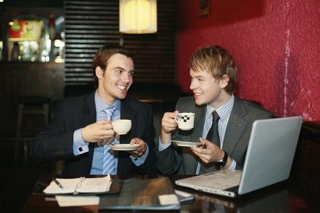 Businessmen enjoying coffeeの写真素材
