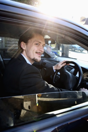Man starting his car engineの写真素材