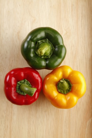 Red, green and yellow capsicumsの写真素材