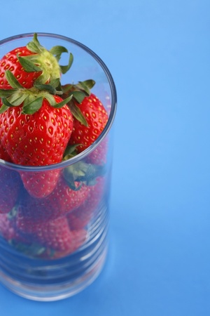 Strawberries in drinking glassの写真素材