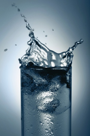 Water splashing in glassの写真素材