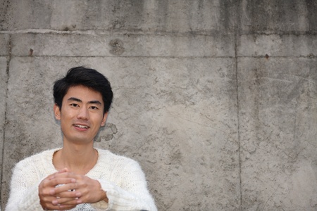 Happy man smiling outdoorsの写真素材