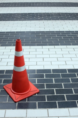 Traffic cone on the pavementの写真素材